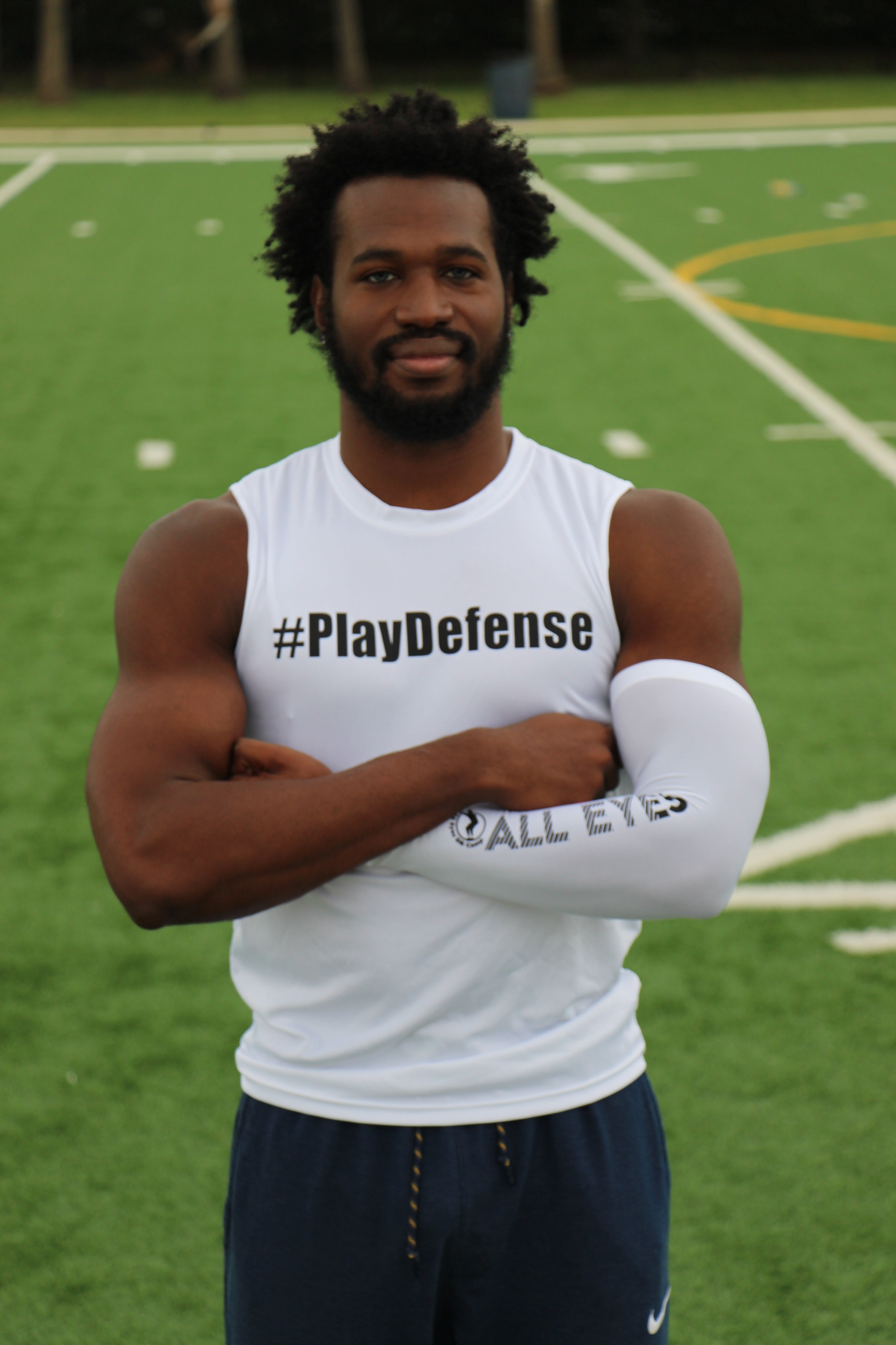 Play Defense Sleeveless Shirt (White)